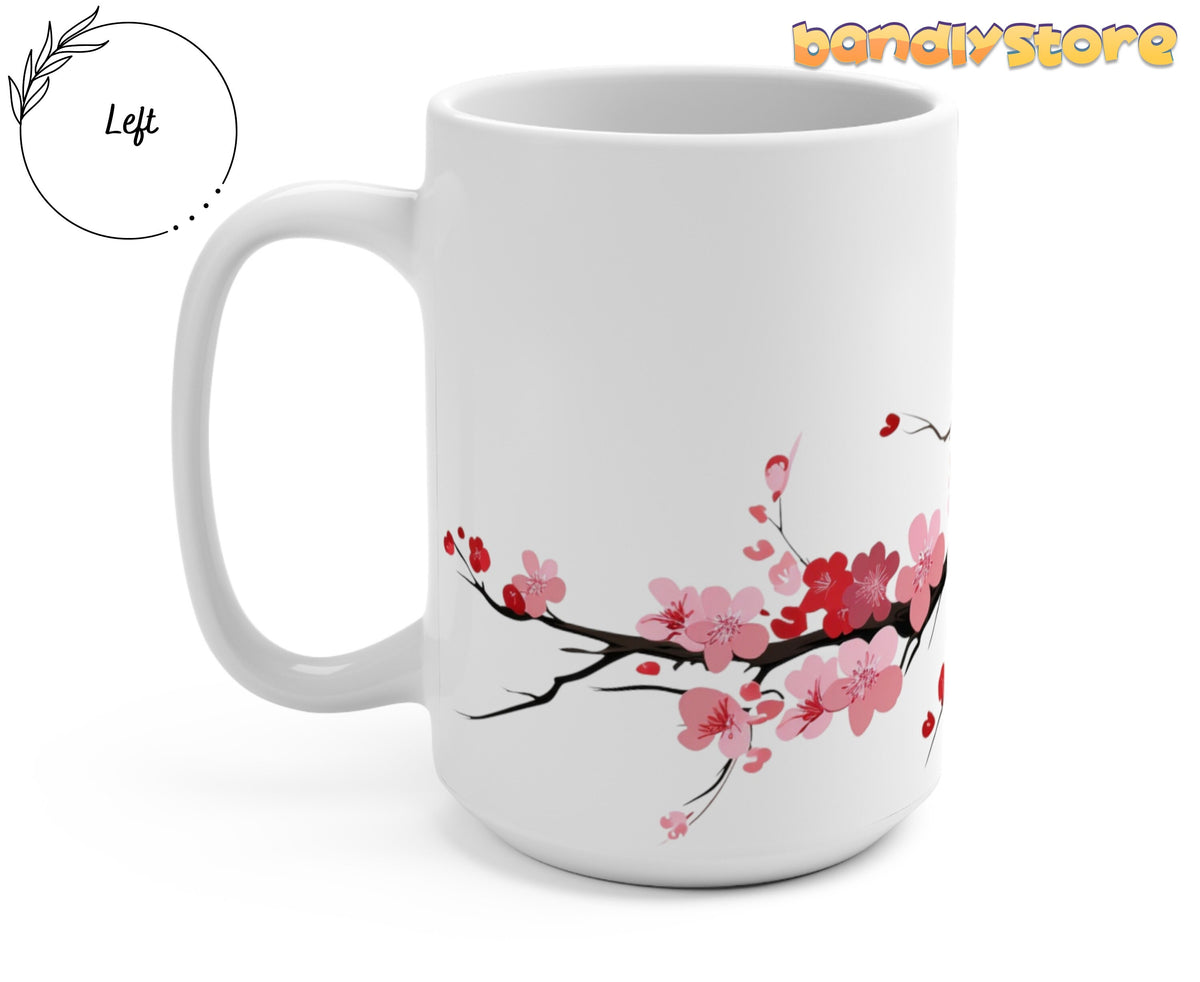 Cherry Blossom Mug shown from a left angle on plain white, pink-red branch design wrapping the white ceramic.