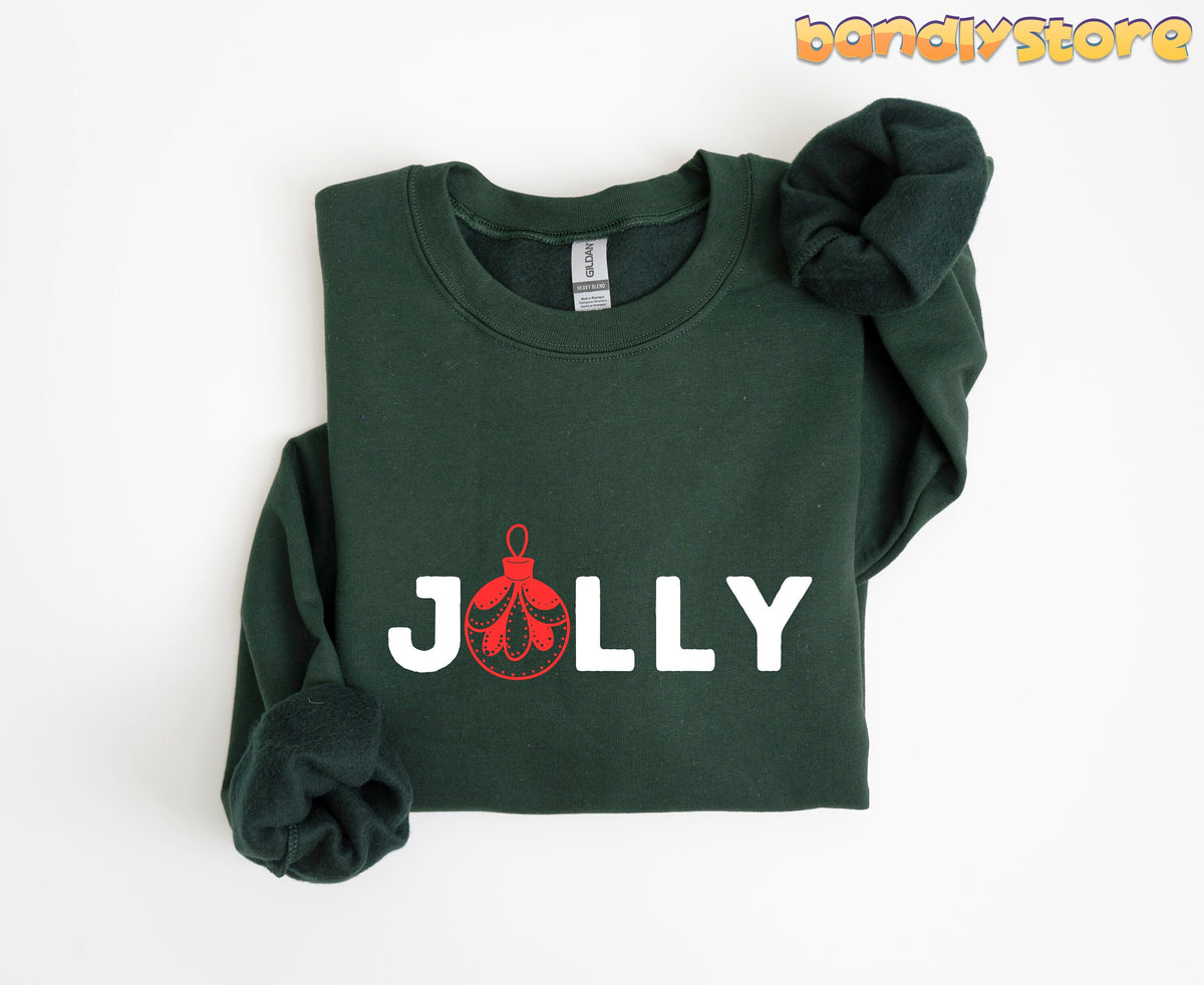 Feeling Jolly Christmas Sweatshirt in forest green folded flat on a plain white background.