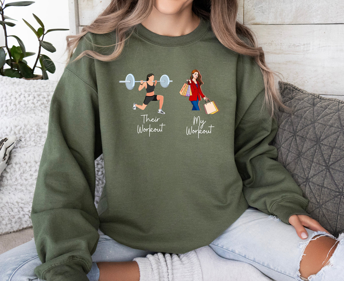 Funny Fitness Sweatshirt in military green on seated person, front view amid couch pillows and plant.