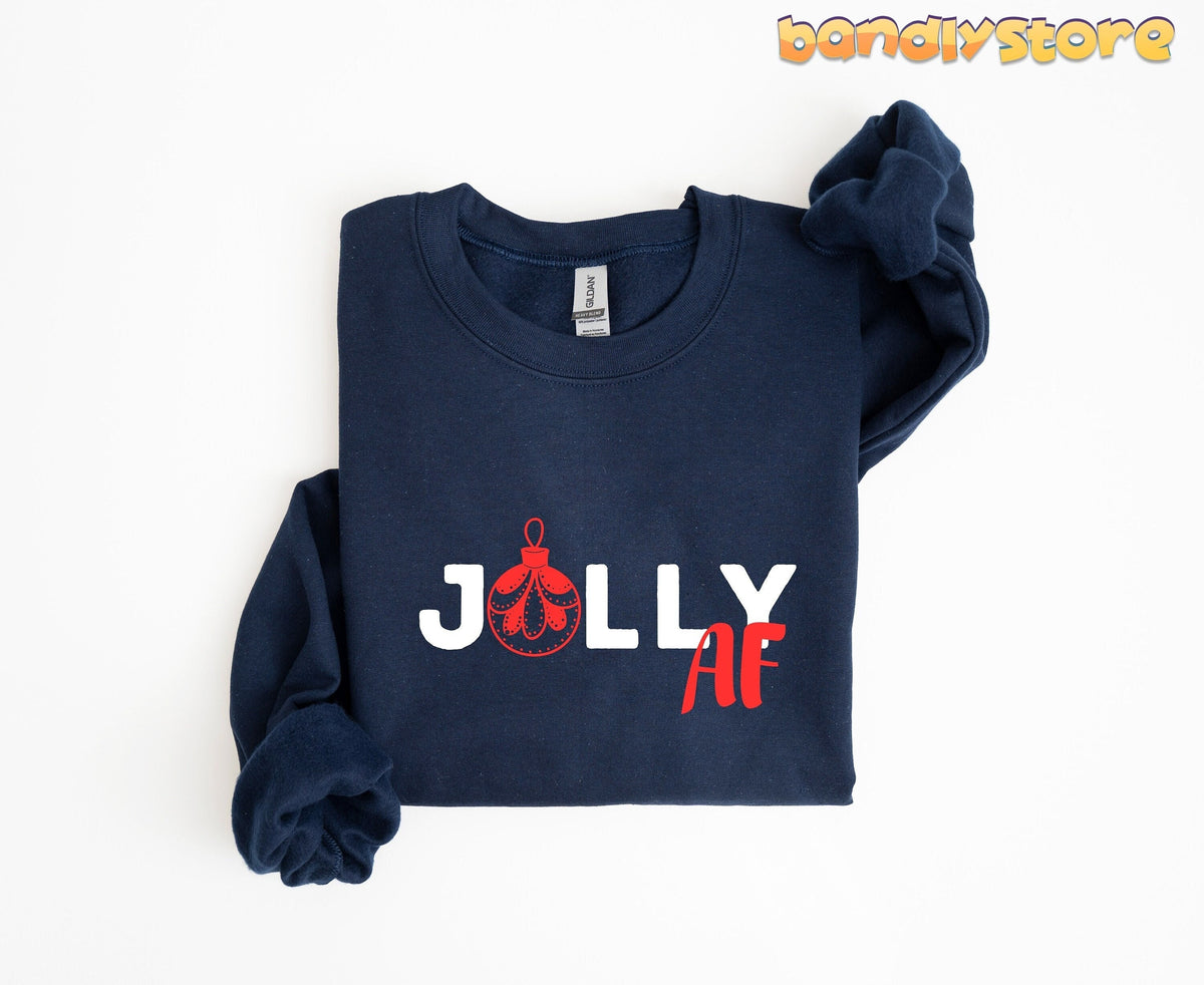Jolly AF Christmas Sweatshirt in navy folded flat on a plain white background.