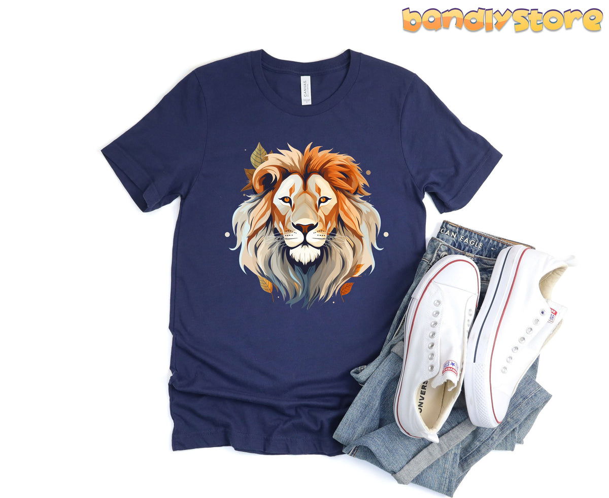Majestic Lion T-Shirt in navy laid flat beside jeans and sneakers.
