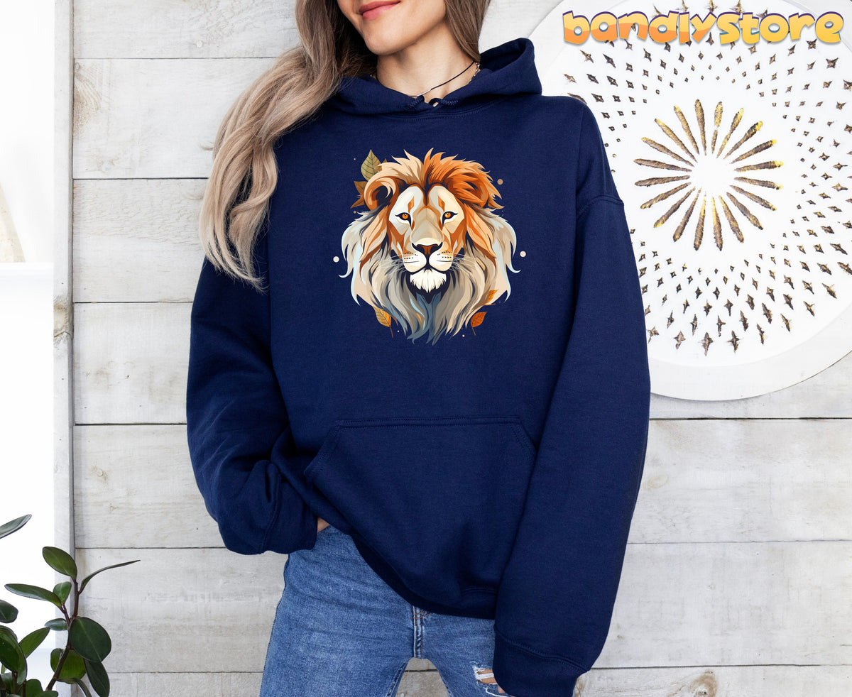 Majestic Lion Hoodie in navy worn front-facing against a light wood wall beside a plant and circular wall art.