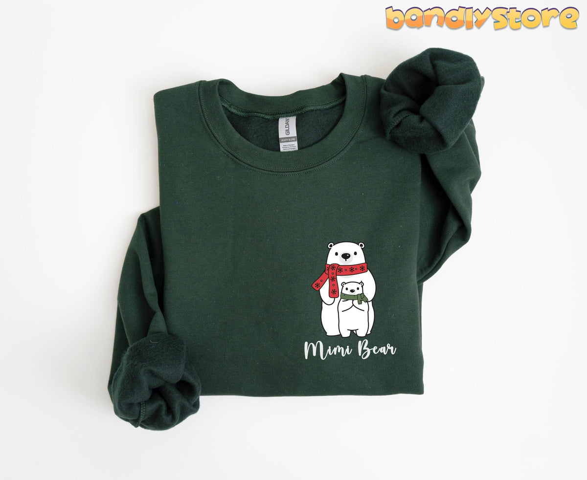 Pocket Mimi Bear Sweatshirt in forest green folded flat on a plain white background.