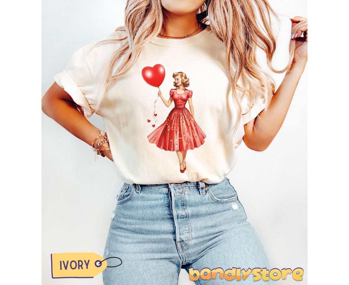 Vintage Valentines Day T-Shirt in ivory on a person viewed from the front wearing jeans against a plain backdrop.