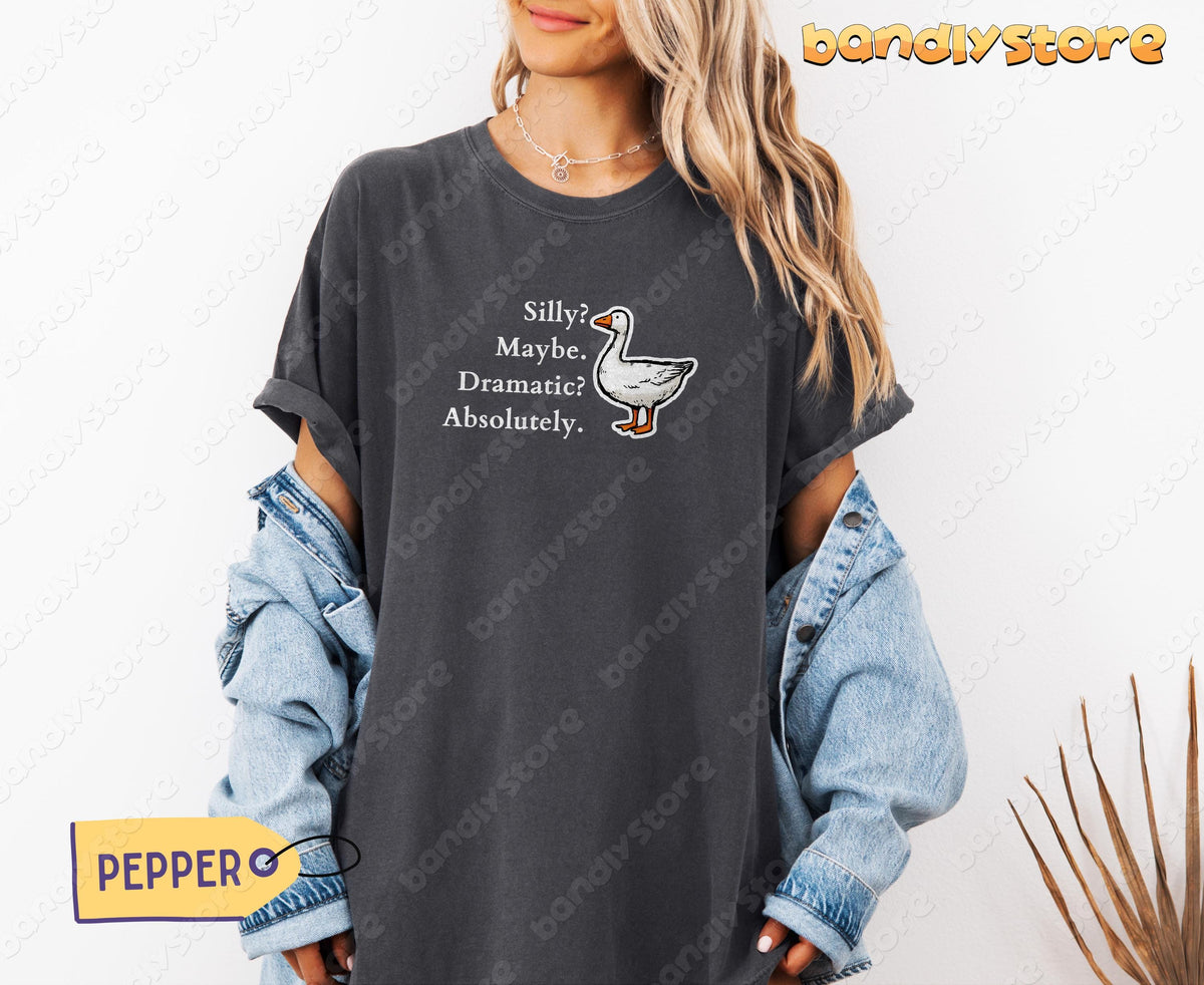 Silly Goose T-Shirt in Pepper on model with denim jacket waist-tied, front view against white wall.