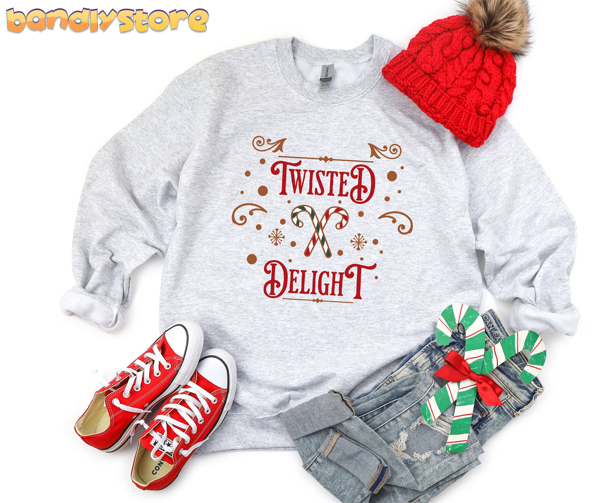 Twisted Delight Candy Cane Sweatshirt in ash, flat-laid with red beanie, sneakers, jeans and candy canes.