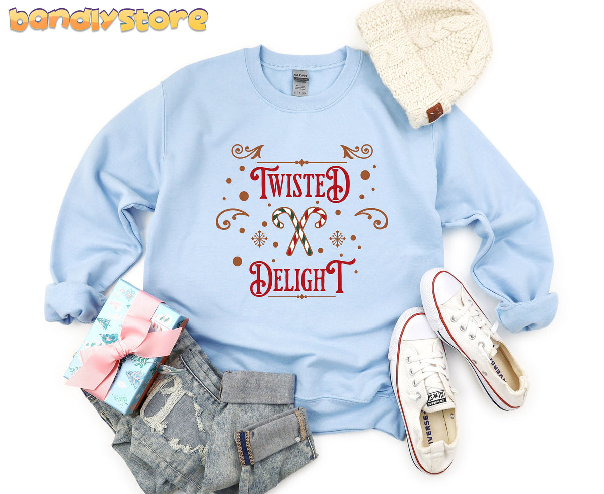 Twisted Delight Candy Cane Sweatshirt in light blue flat lay with beanie, gift, jeans and sneakers.