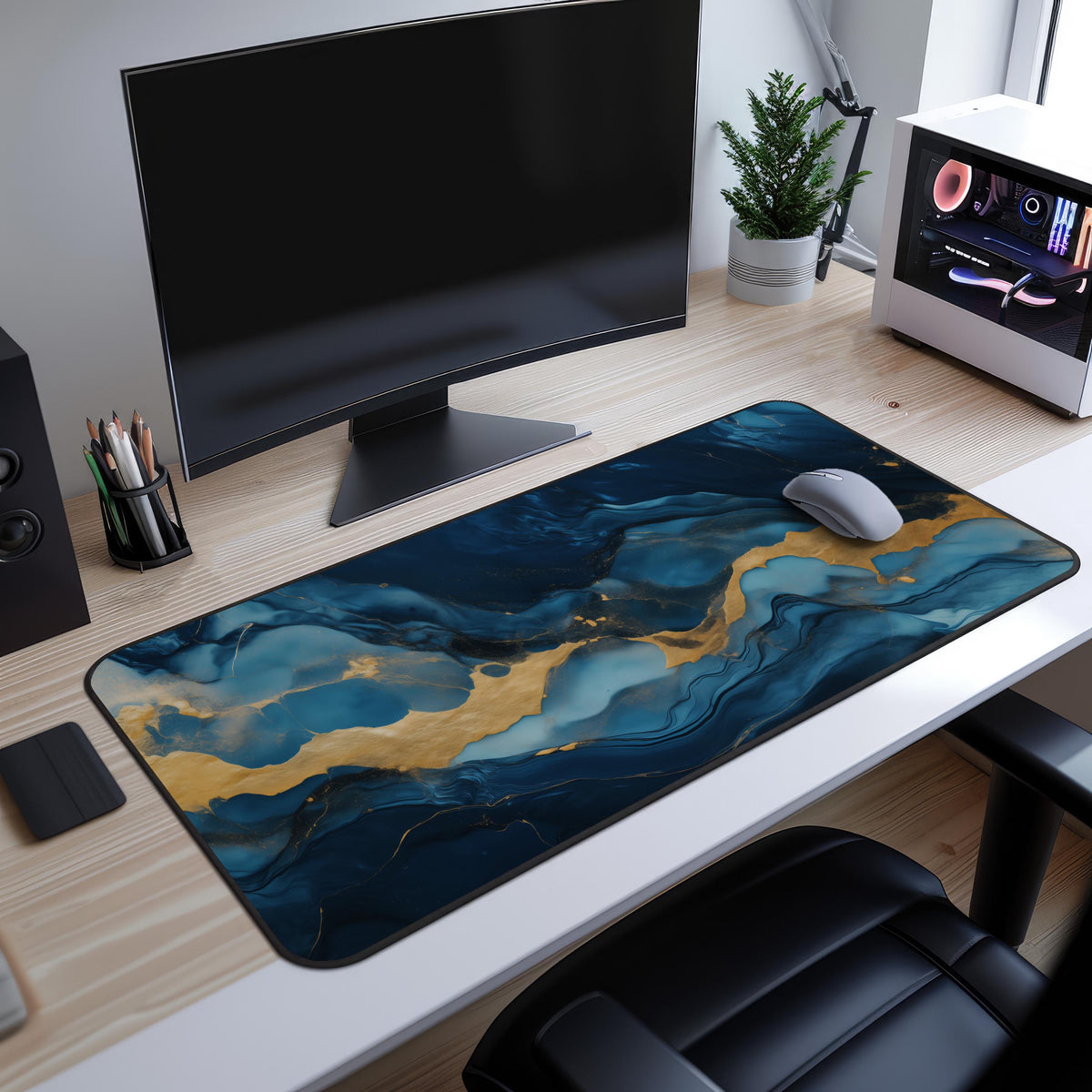 Abstract Marble Desk Mat on a light wood desk under a monitor, with mouse, plant and PC tower nearby.