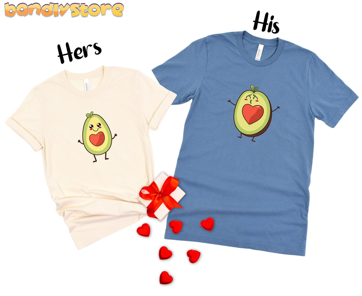 Cute Avocado Couple T-Shirt Natural front view on white beside blue shirt, gift and hearts.