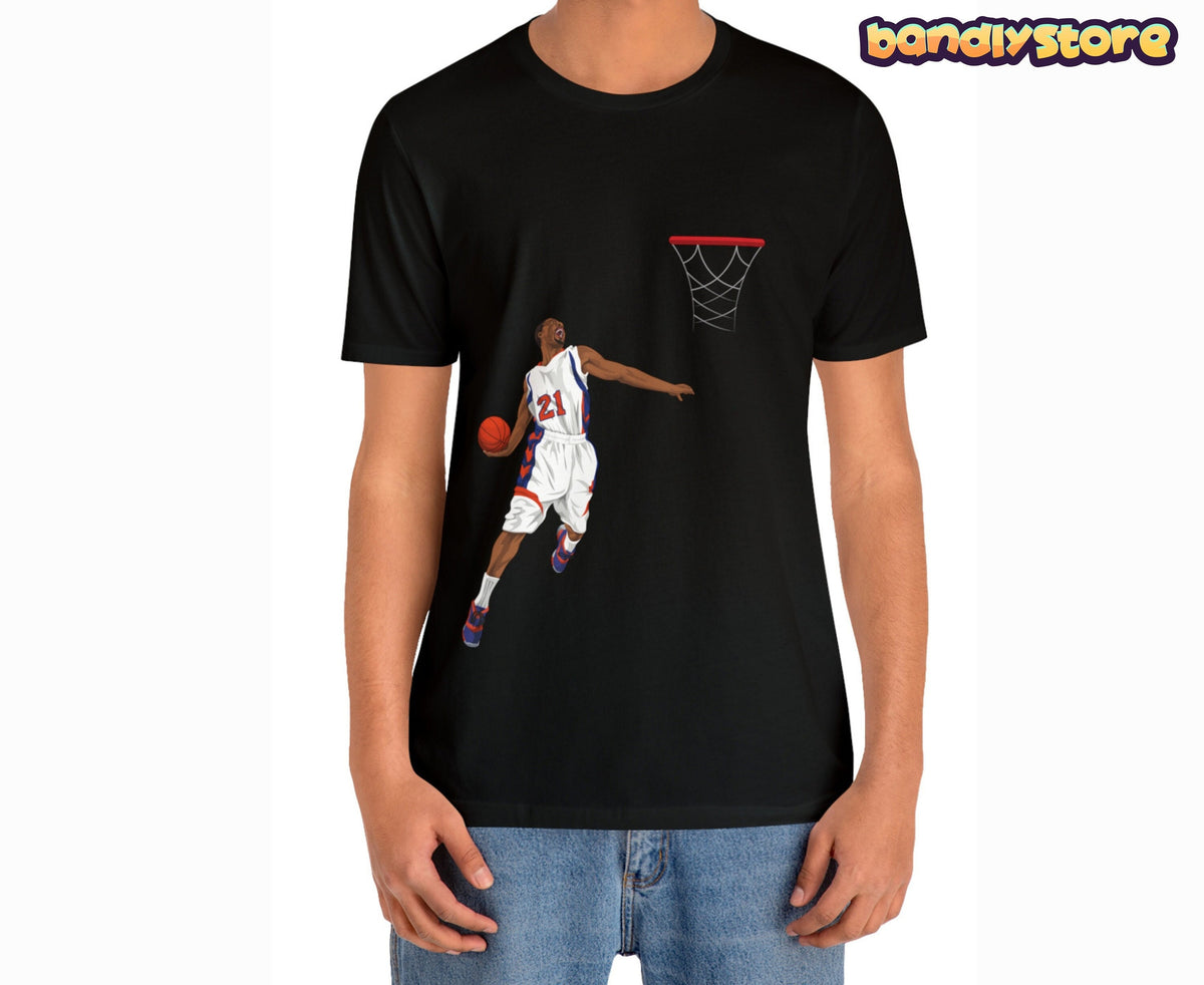 Basketball Slam Dunk T-Shirt on a black tee showing a player mid-dunk toward a hoop, front view on a model.