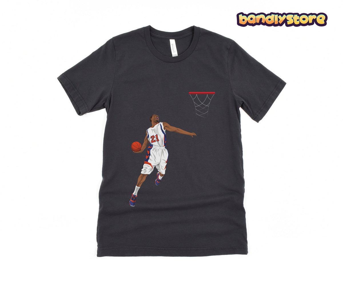 Basketball Slam Dunk T-Shirt on dark grey fabric showing a leaping player in white 21 jersey dunking toward a red rim.