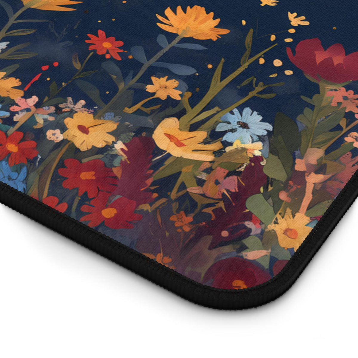 Black Cat And The Moon Desk Mat angled corner detail on white background displaying floral print and black edge.