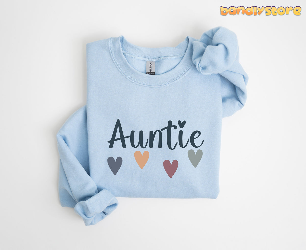 Boho Auntie Sweatshirt in light blue folded flat on a white background with one sleeve knotted.