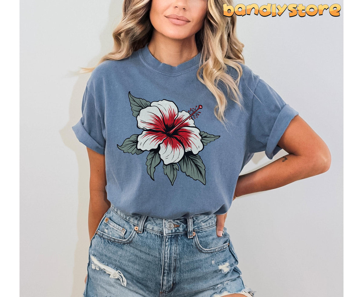 Boho Hibiscus Flower T-Shirt in Blue Jean, front view on a model against a plain wall.