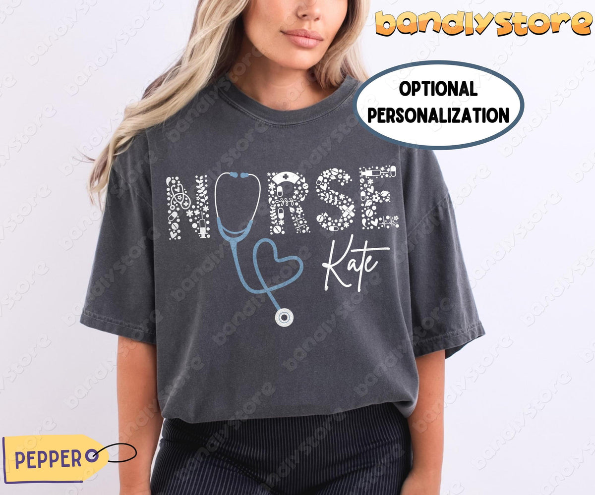 Custom Name Nurse T-Shirt in Pepper on a model facing forward against a plain backdrop.
