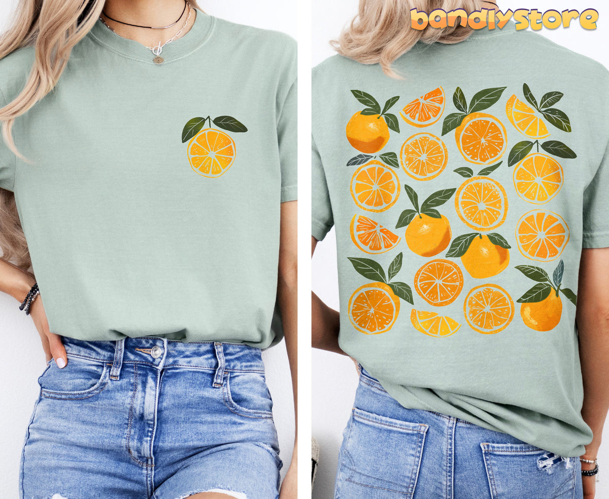 Cute Oranges T-Shirt with Back Print shown front and back on a model in Bay, small chest orange left, full citrus print rear.