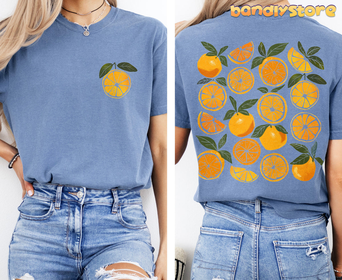 Cute Oranges T-Shirt with Back Print in Blue Jean, front and back on model with jeans by plain wall.