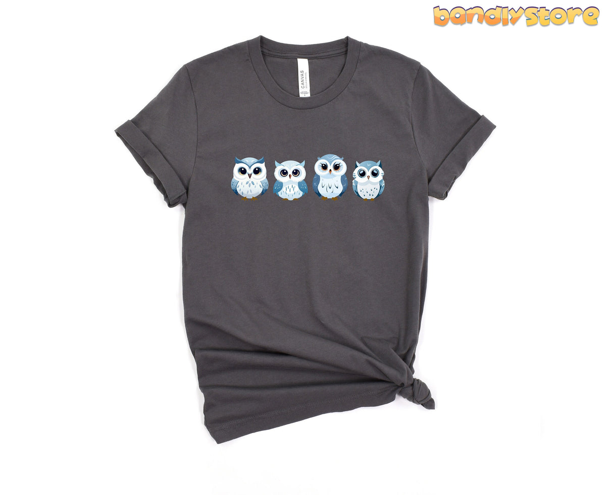 Cute Snow Owl T-Shirt in asphalt laid flat on white background with four owls across the chest.