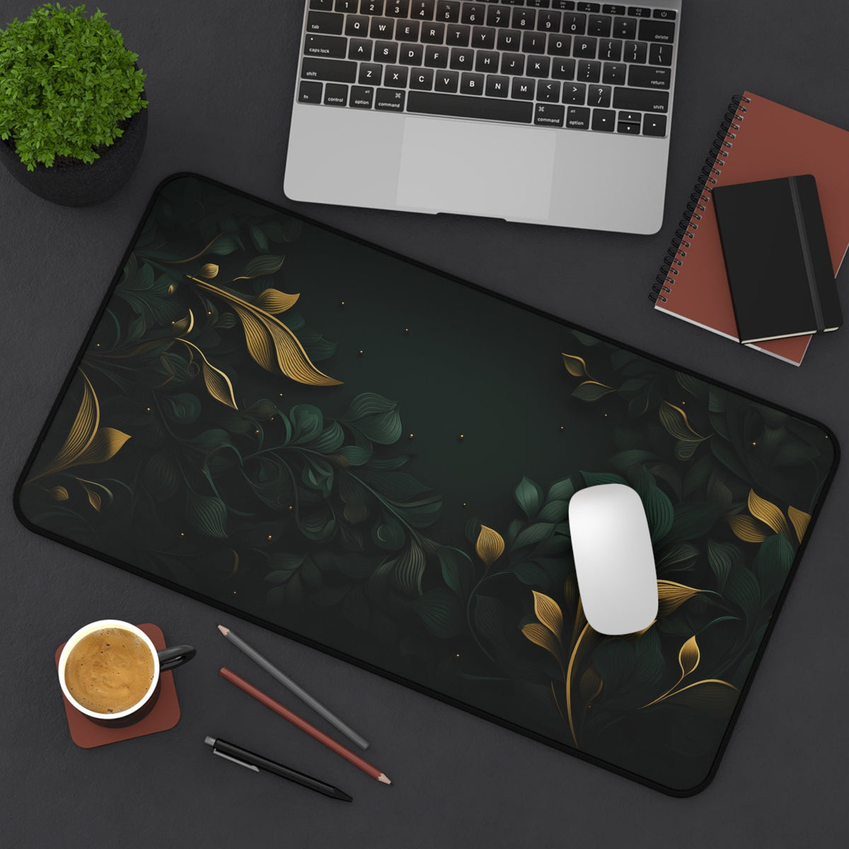 Botanical Leaves Desk Mat 12 × 22 inches top view on desk with laptop, plant, notebooks, coffee, pens, mouse.