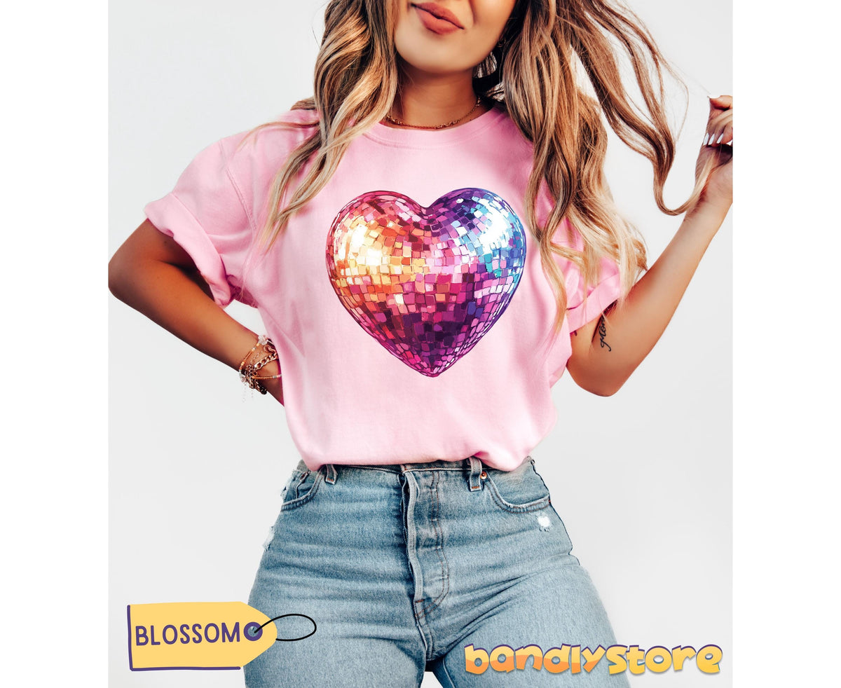 Disco Ball Heart T-Shirt in Blossom on a model posing frontally against a plain white background with jeans.