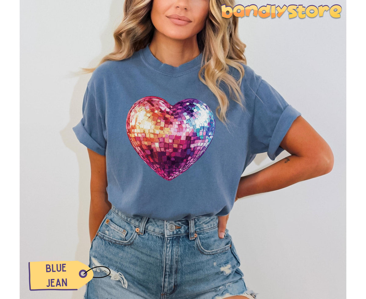 Disco Ball Heart T-Shirt in Blue Jean on a model facing forward against a plain wall, hands in jeans pockets.