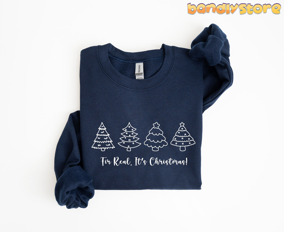 Fir Real It's Christmas Sweatshirt in navy folded flat on white background with knotted sleeve.