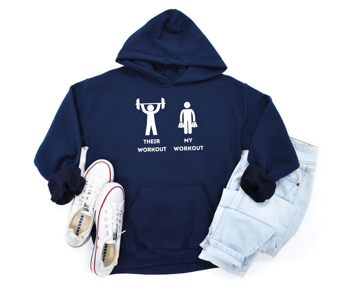 Funny Workout Hoodie in navy laid flat from above beside sneakers and jeans.