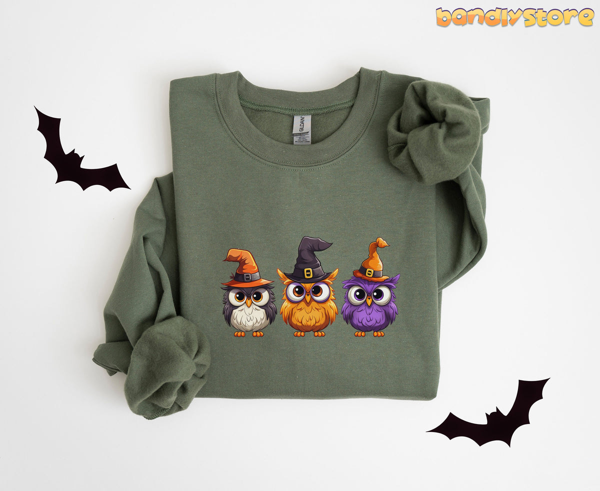 Halloween Owl Sweatshirt in military green folded flat on white background with black bat silhouettes.