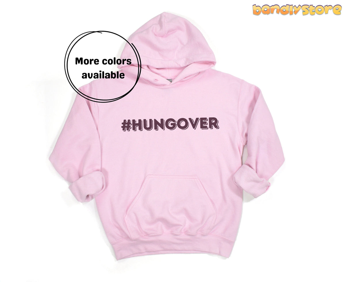 Hashtag Hangover Hoodie in pink laid flat front-facing on a plain white background.
