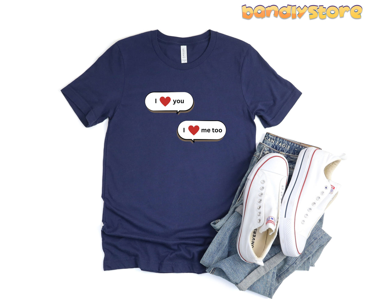 I Heart Myself T-Shirt in navy laid flat next to jeans and white sneakers on white background.