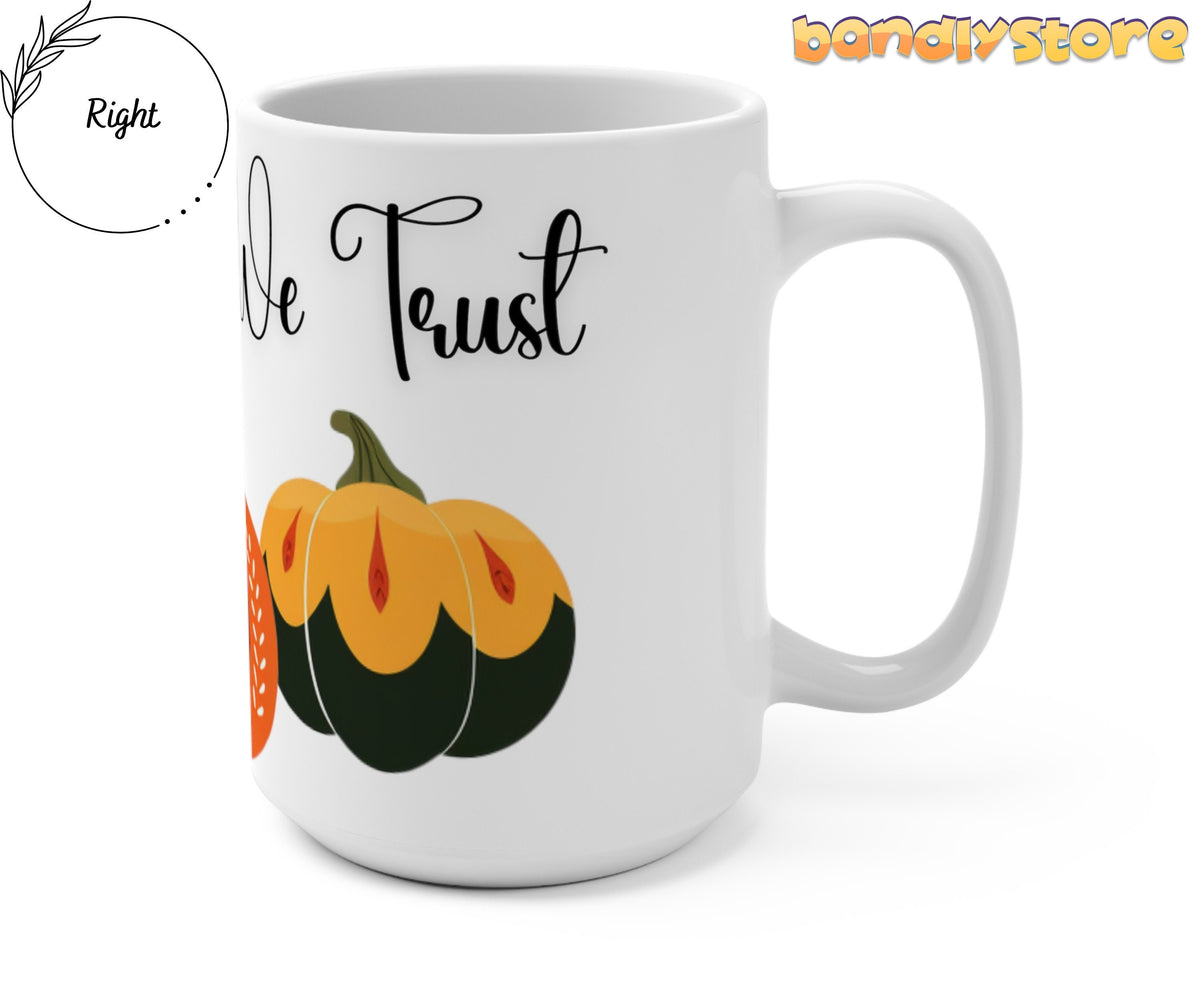 In Pumpkins We Trust Mug angled on plain white background with handle at right and partial pumpkin design visible.