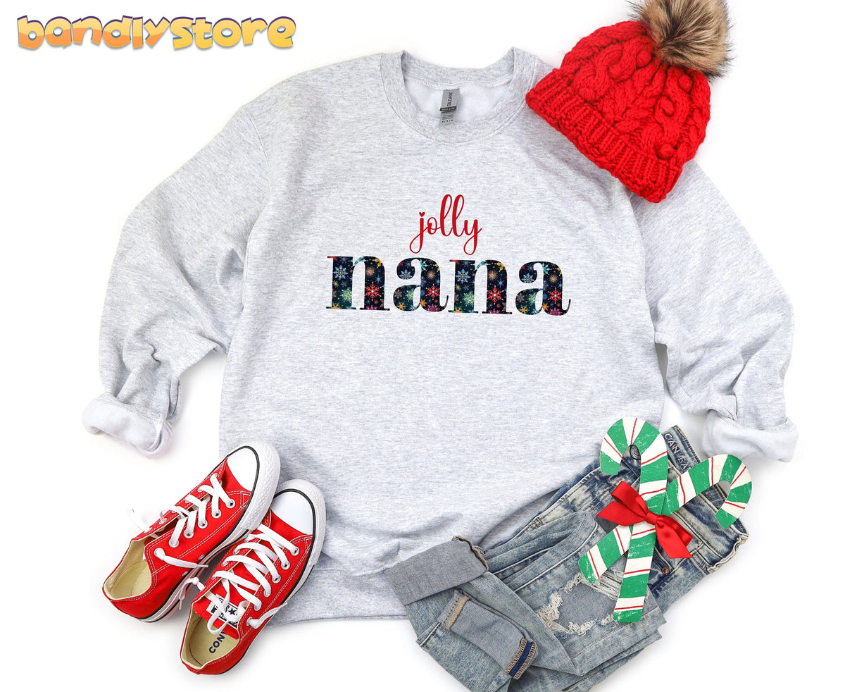 Jolly Nana Sweatshirt in Ash, overhead flat lay with beanie, sneakers, jeans and candy canes.