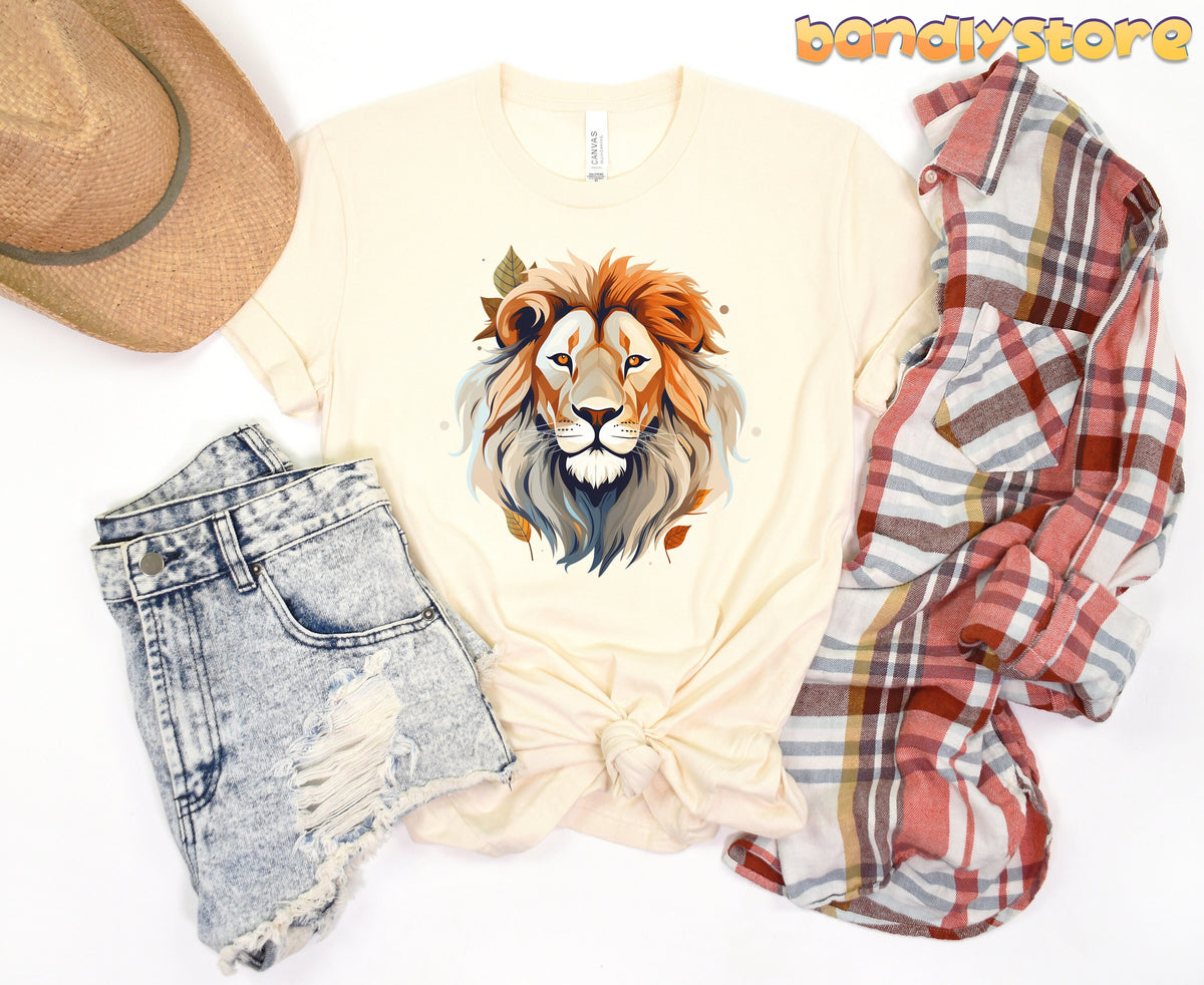 Majestic Lion T-Shirt in natural, overhead flat lay with straw hat, ripped denim shorts and plaid shirt.