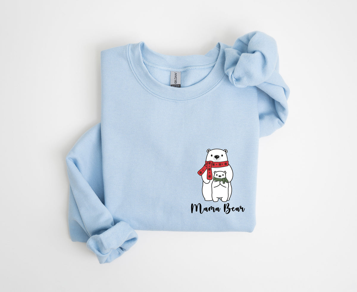 Pocket Mama Bear Sweatshirt in light blue folded flat on a white background with knotted sleeve.