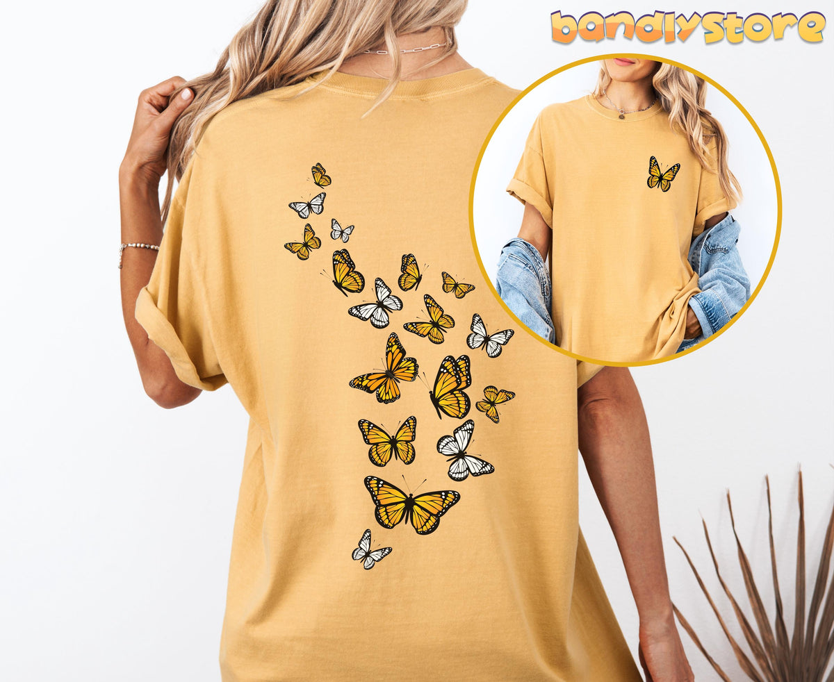 Monarch Butterfly T-Shirt with Back Print on a mustard tee, rear view with butterflies cascading down and a front inset.