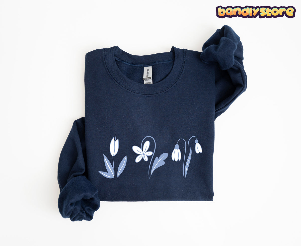 Monochrome Spring Flowers Sweatshirt in navy folded flat on a plain white background.