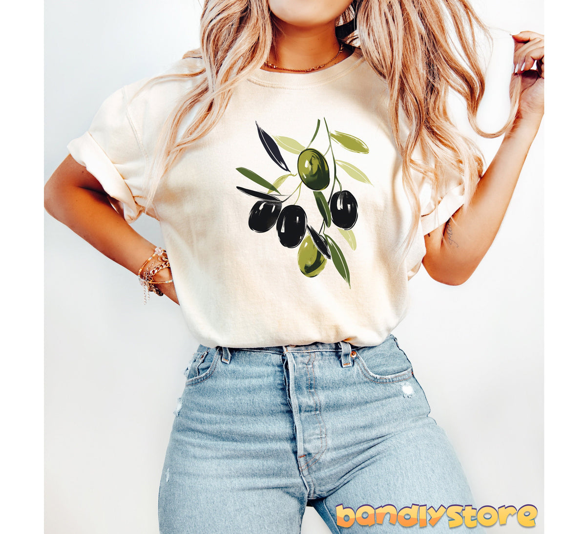 Olive Branch T-Shirt in ivory on a front-facing model against a plain white background with jeans.