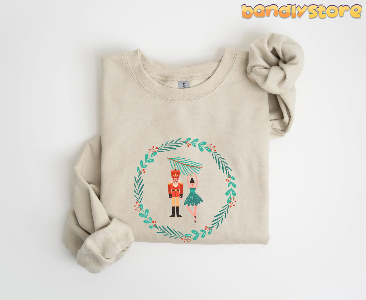 Nutcracker Ballet Sweatshirt in sand folded flat on a white background showing the wreath design.