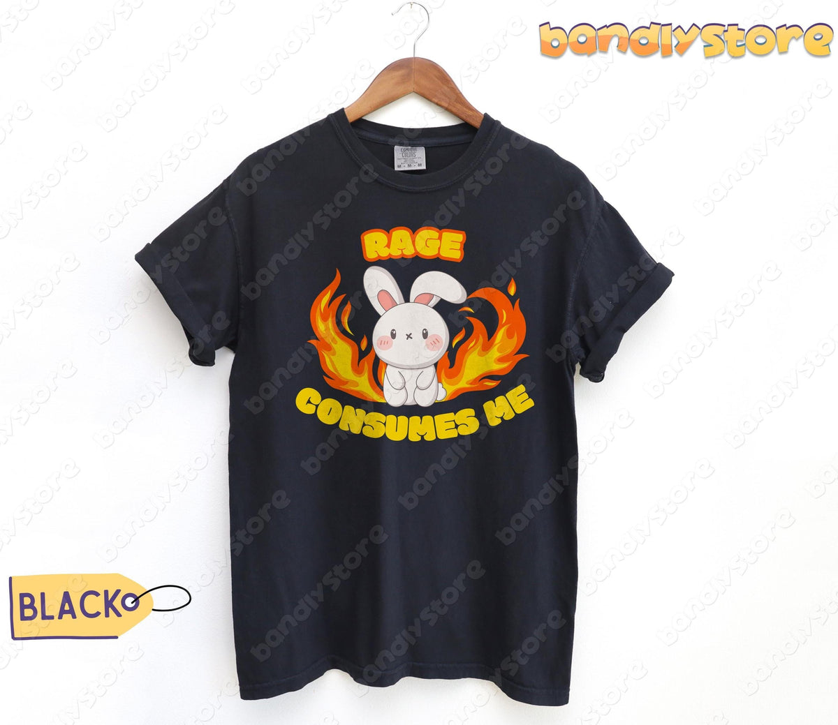 Rage Consumes Me T-Shirt in black hanging on a wooden hanger against a plain white wall.