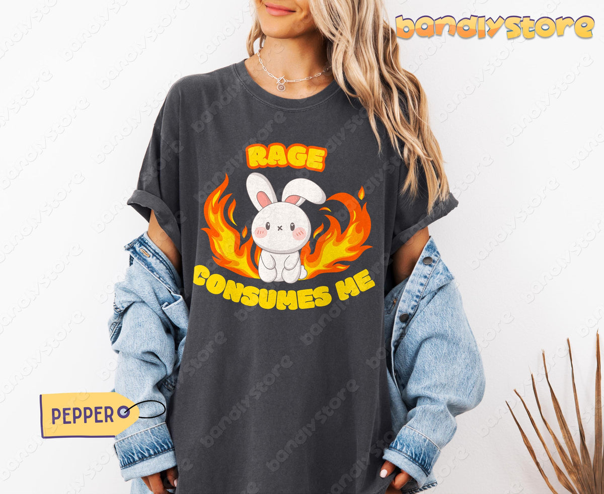 Rage Consumes Me T-Shirt in Pepper on a model against a white wall with denim jacket off shoulders.
