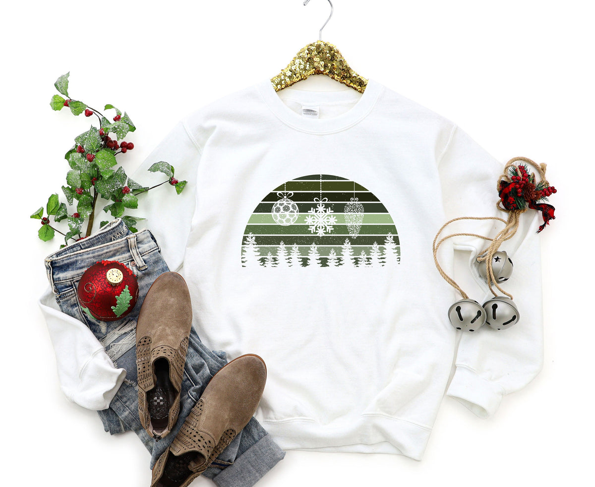 Retro Christmas Sweatshirt in white flat from above with holly, jeans, boots and bells around it.