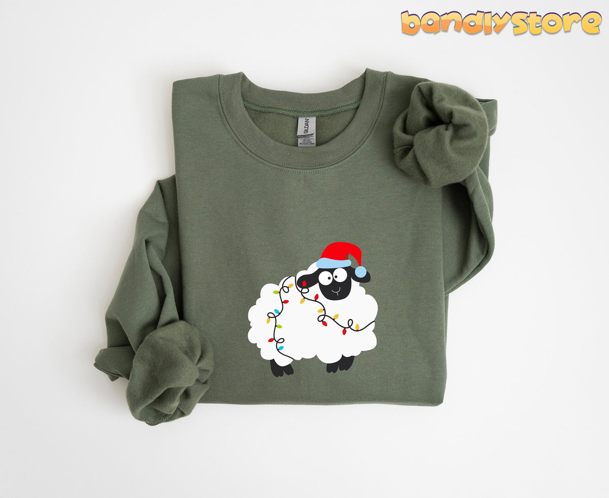 Sheep Christmas Lights Sweatshirt in Military Green folded flat on a white background from above.