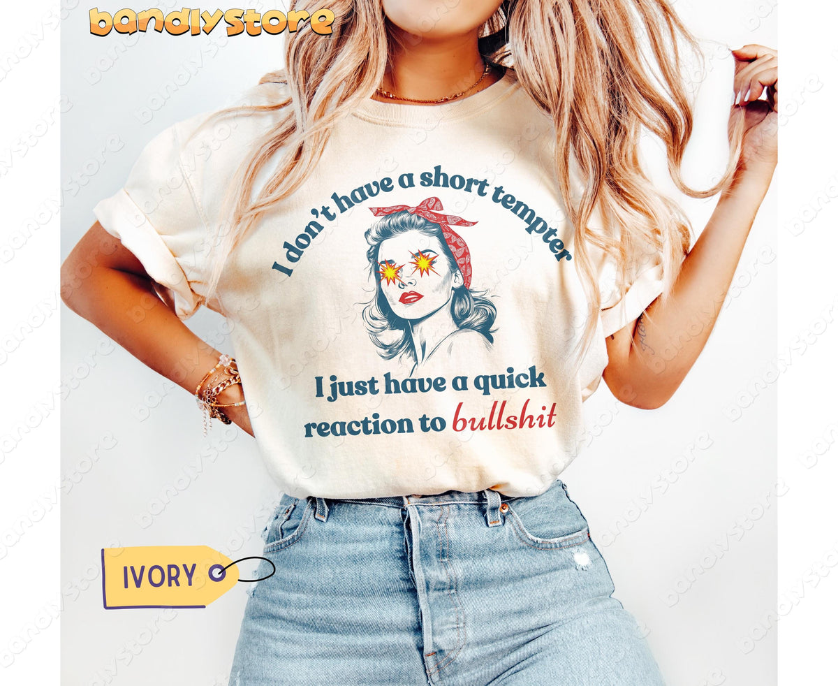 I Don't Have A Short Temper T-Shirt in ivory, worn front-facing by a model with jeans against a plain backdrop.