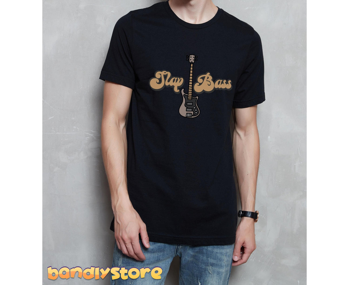 Slap Bass T-Shirt in black on a person standing front-facing against a gray wall.