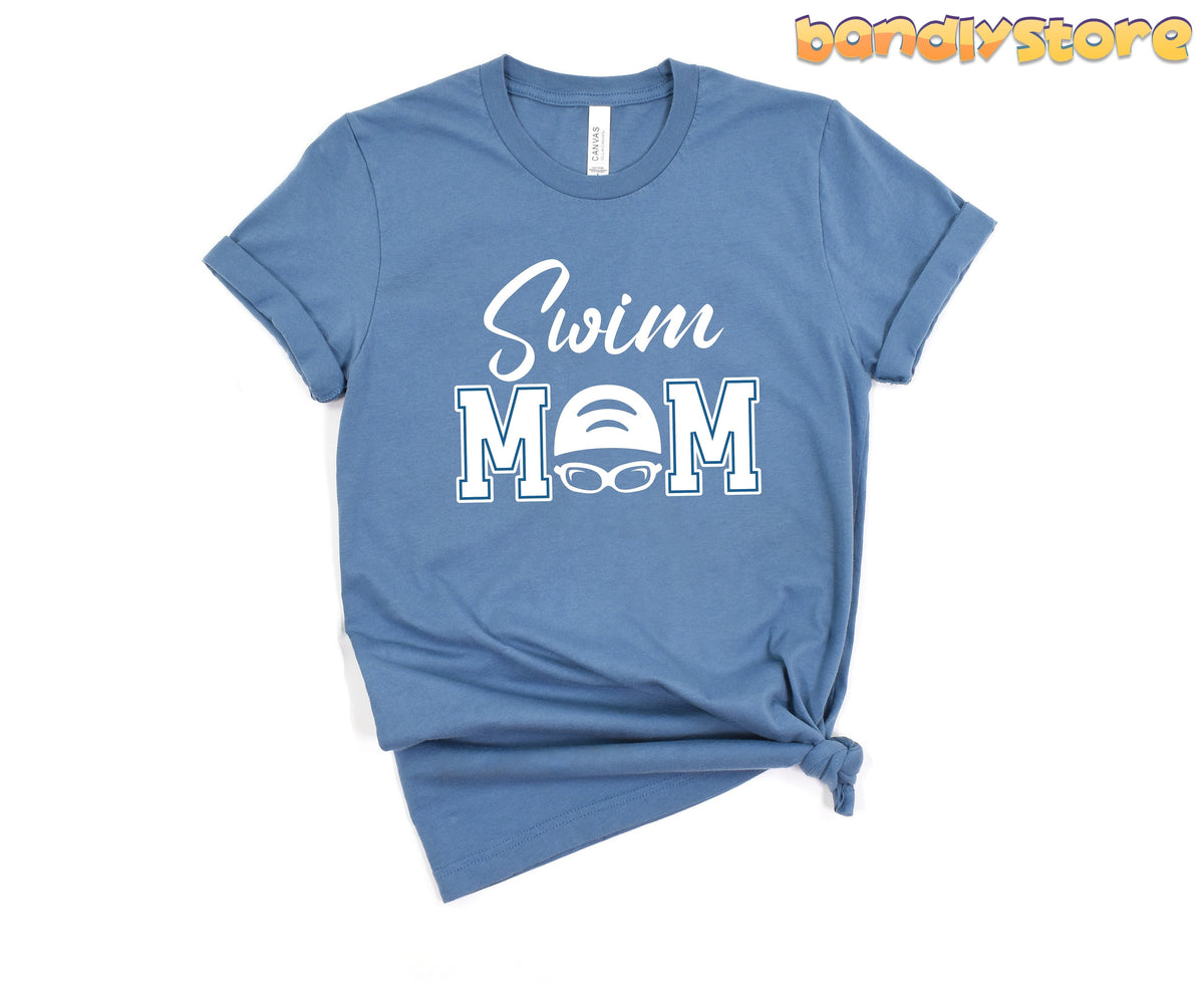Swim Mom T-Shirt in steel blue shown from the front knotted at the hem on a plain white background.