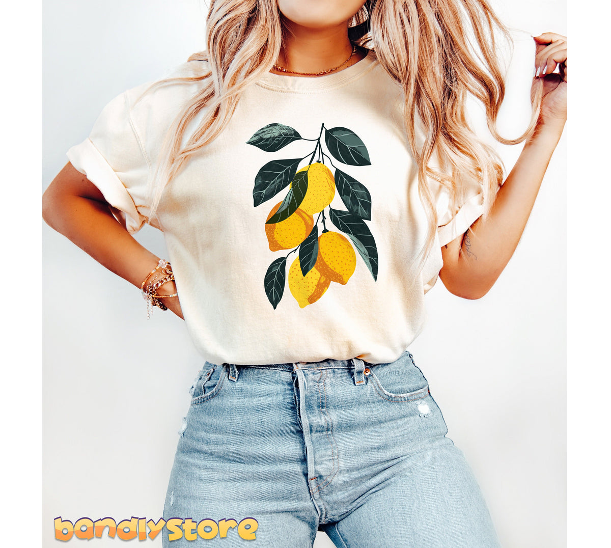 Vintage Lemons T-Shirt in ivory, front view on a person against a plain white backdrop.