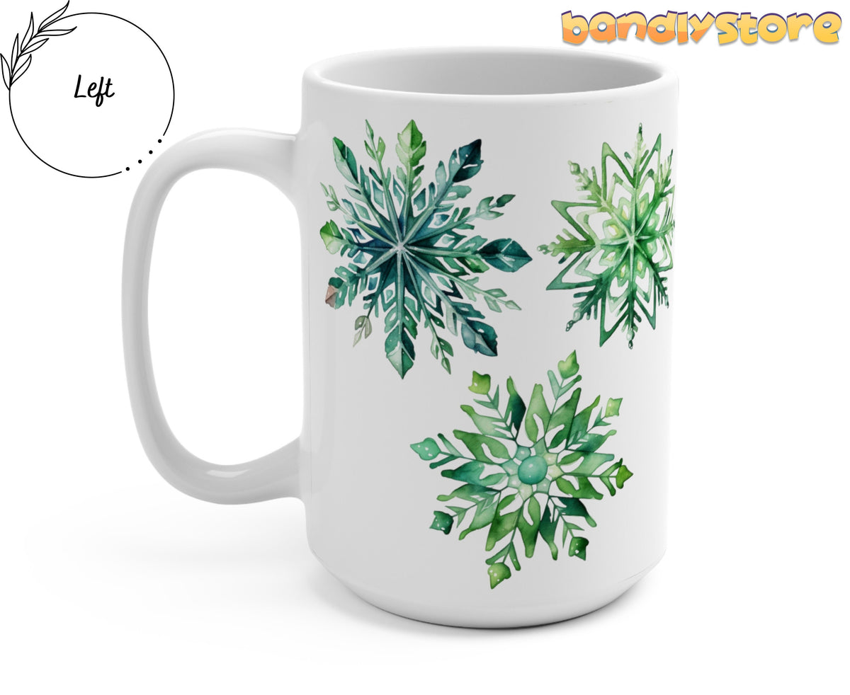 Watercolor Snowflake Mug angled left on white background, handle visible beside three green snowflakes.